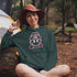 Introducing the ultimate companion for your outdoor adventures – the Happy Camper Hoodie! Designed with the enthusiastic explorer in mind, this hoodie is not just a piece of clothing; it's a declaration of joy and positivity in the great outdoors.
